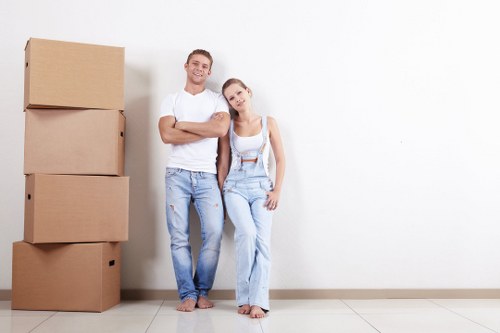 Student removals team helping with boxes near an Ilford residential property