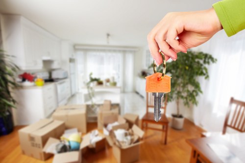 Moving team handling a home removal in Ilford street access