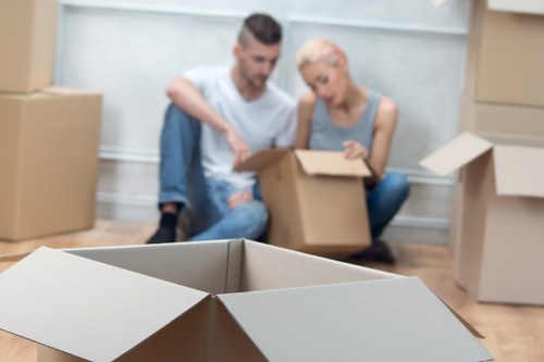 Loading furniture and boxes into a removal van in Ilford
