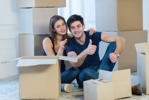 Office relocation planning with labelled boxes and workstation furniture