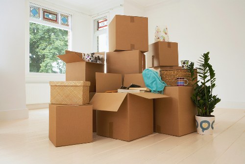 Packed office furniture and IT equipment ready for relocation