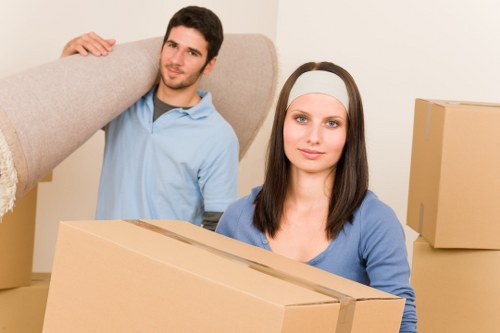 Moving boxes and household items ready for transport in Ilford